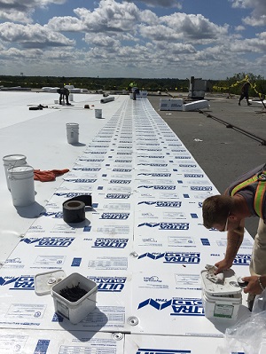 factory flat roof installation in Madison WI